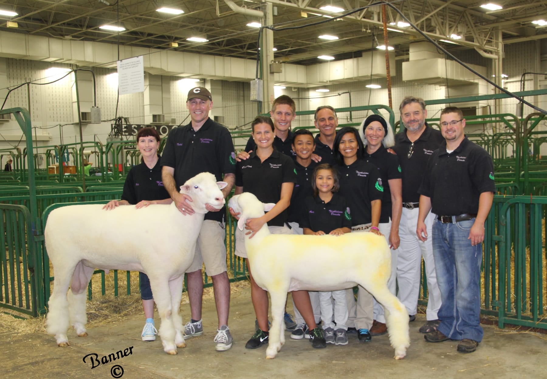 Robert A. Schembs and group displaying animals for show